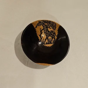 African handmade wooden bowl with an animal print design, ideal for serving or decorative use.