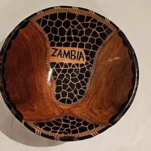 African handmade wooden bowl featuring a decorative hand-painted design, perfect for serving or as home decor.