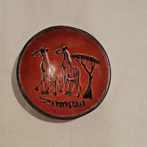 Hand-painted African coaster bowl with giraffe design and Zambia inscription