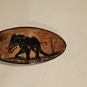 Decorative wooden serving dish hand-carved with tribal elephant design, ideal for serving and adding a unique touch to your home decor.