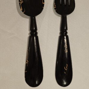 Handcrafted African wooden serving utensils with elegant giraffe-shaped handles